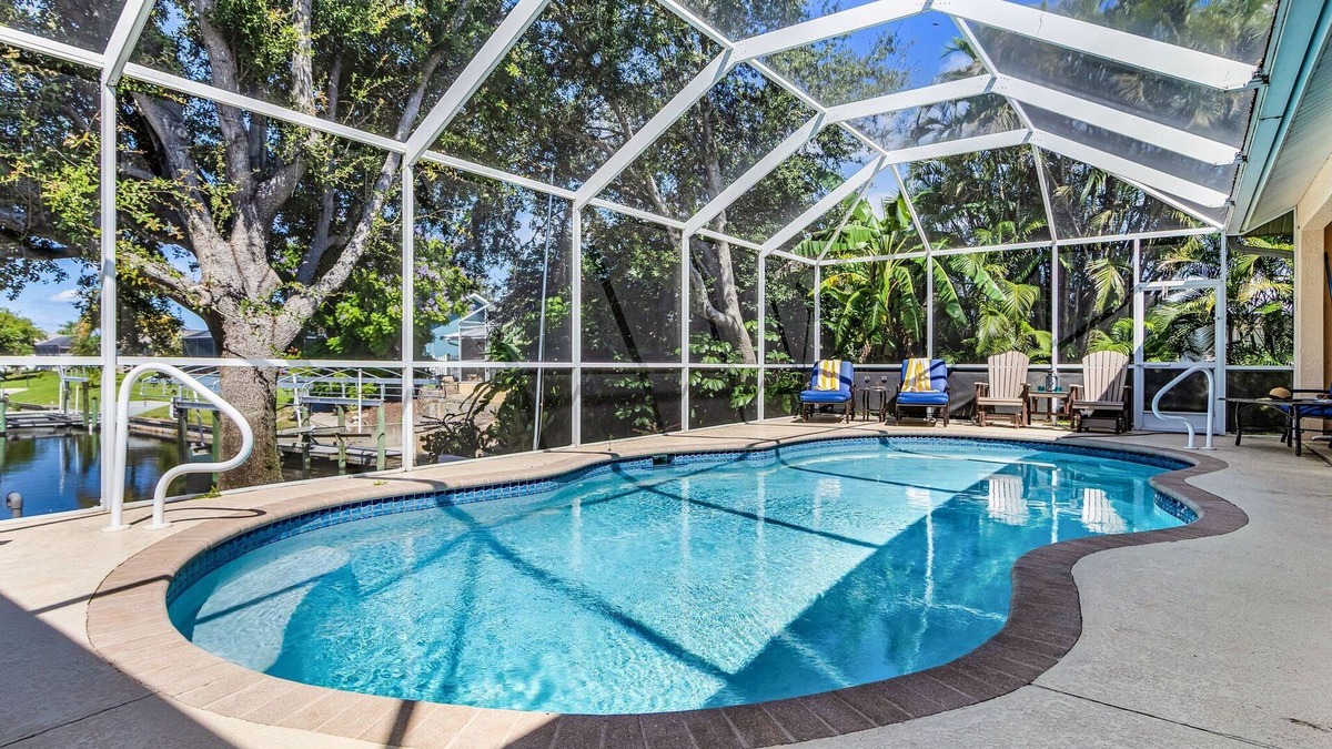 Caloosahatchee House | Waterfront Bliss with Heated Pool, Private Dock & Gulf Access – Lotus Cove