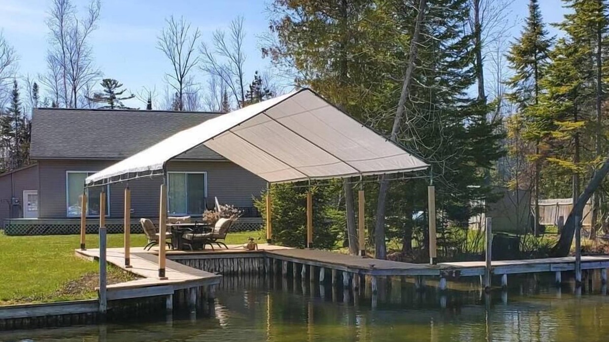 Alanson House | Waterfront Cottage with Covered Boat Slip