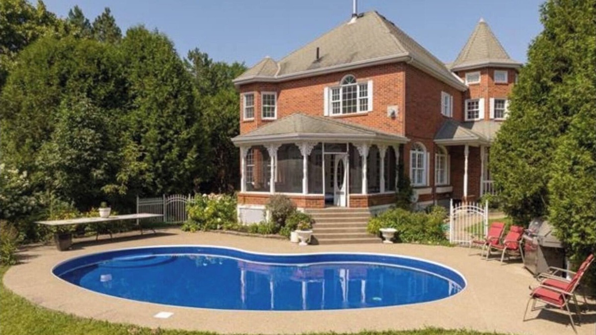 Vaudreuil House | Waterfront Heated pool Private acre yard BBQ Wood Fireplace