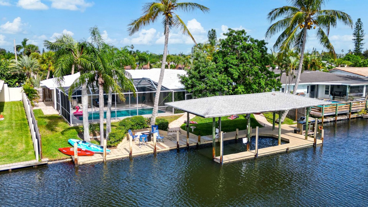 Venetian Way House | Waterfront Heated Pool w/Boat Dock & Game Room - 4bd/2ba Paradise Found