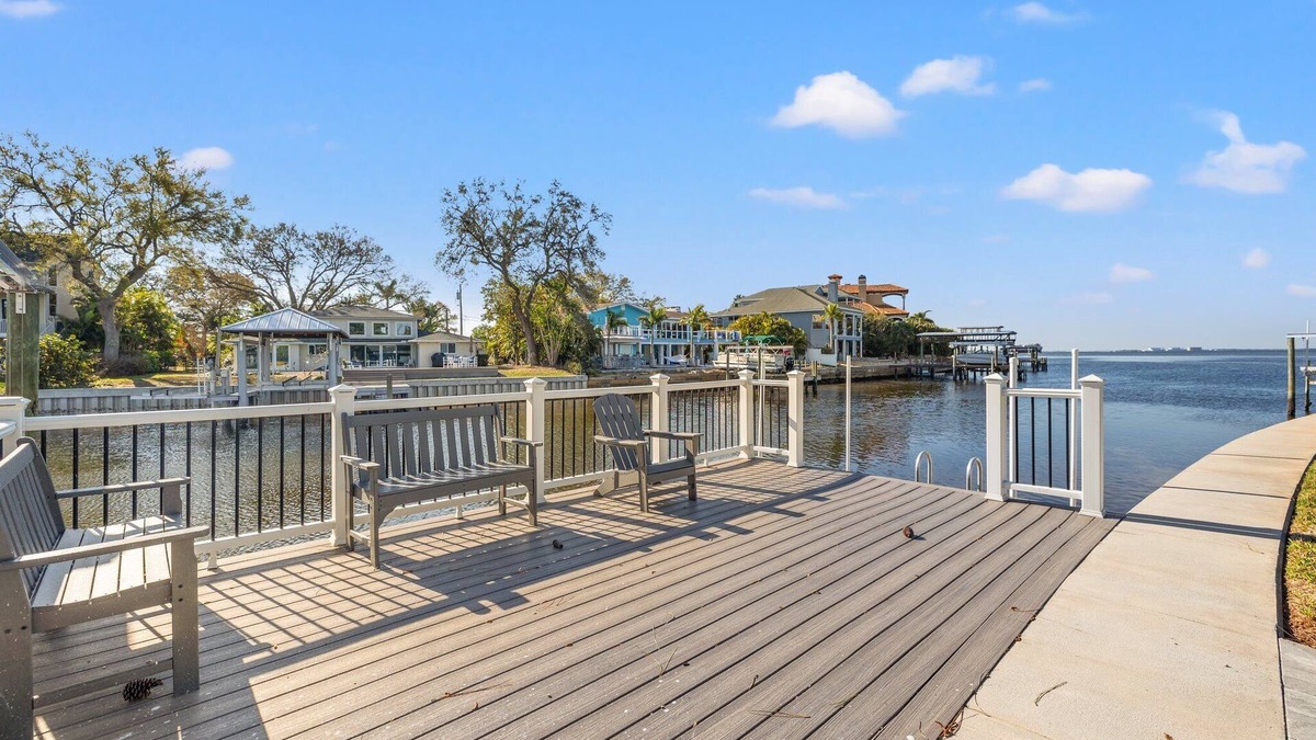 Palm Harbor House | Waterfront Island Oasis FULLY REMODELED! W/BOAT DOCK!