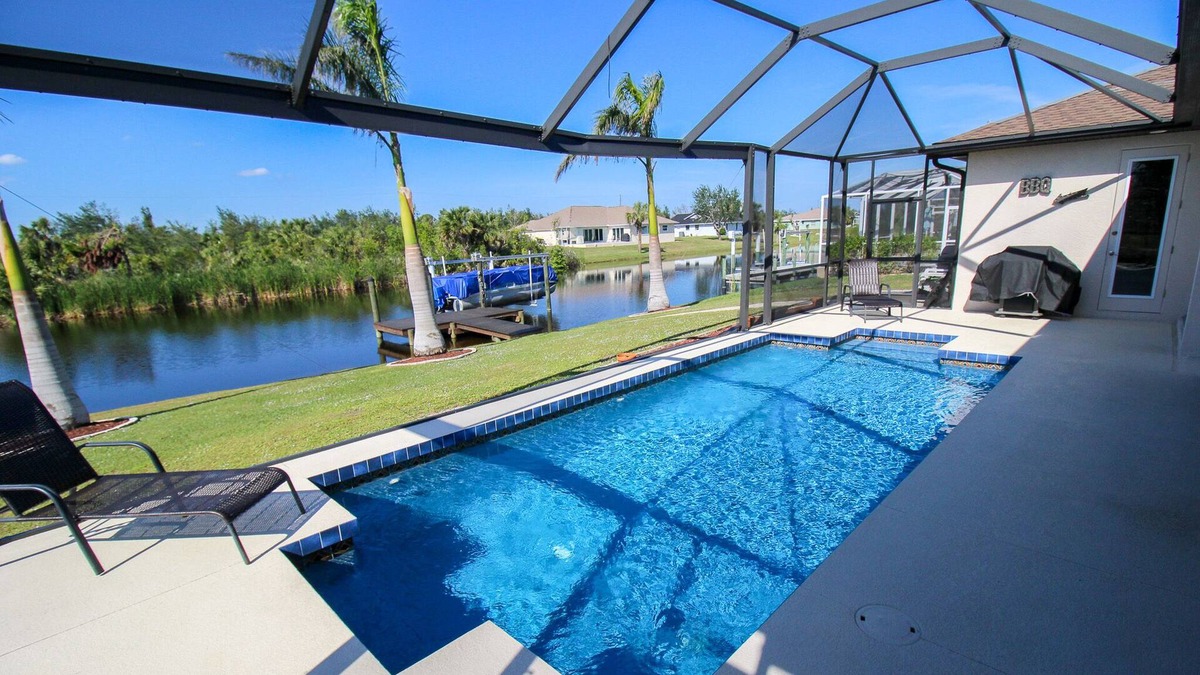 South Gulf Cove House | Waterfront, Private Pool, Three Palms