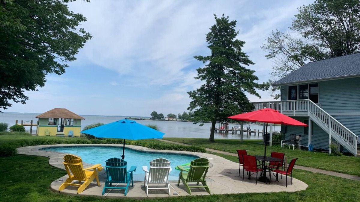 Kent Narrows House | Waterfront property on 3/4 acres with private beach, pool, hot tub, and pier.