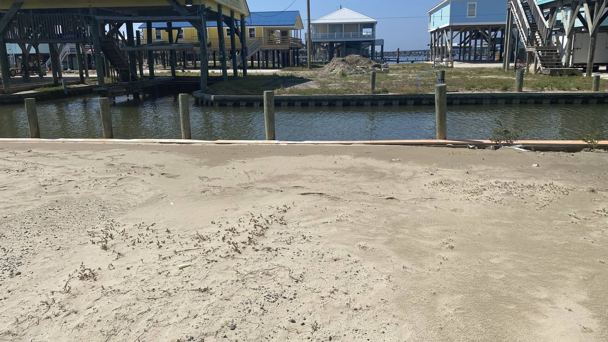 Grand Isle RV Rental | Waterfront RV Lot in upscale neighborhood, water, electric, sewage provided