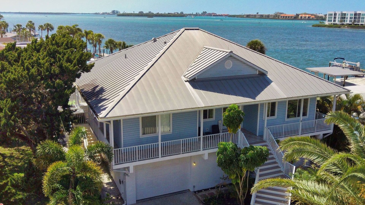 Englewood House | Waterfront Tropical Paradise, 5mins. to beach, pool/hot tub, game room, kayaks