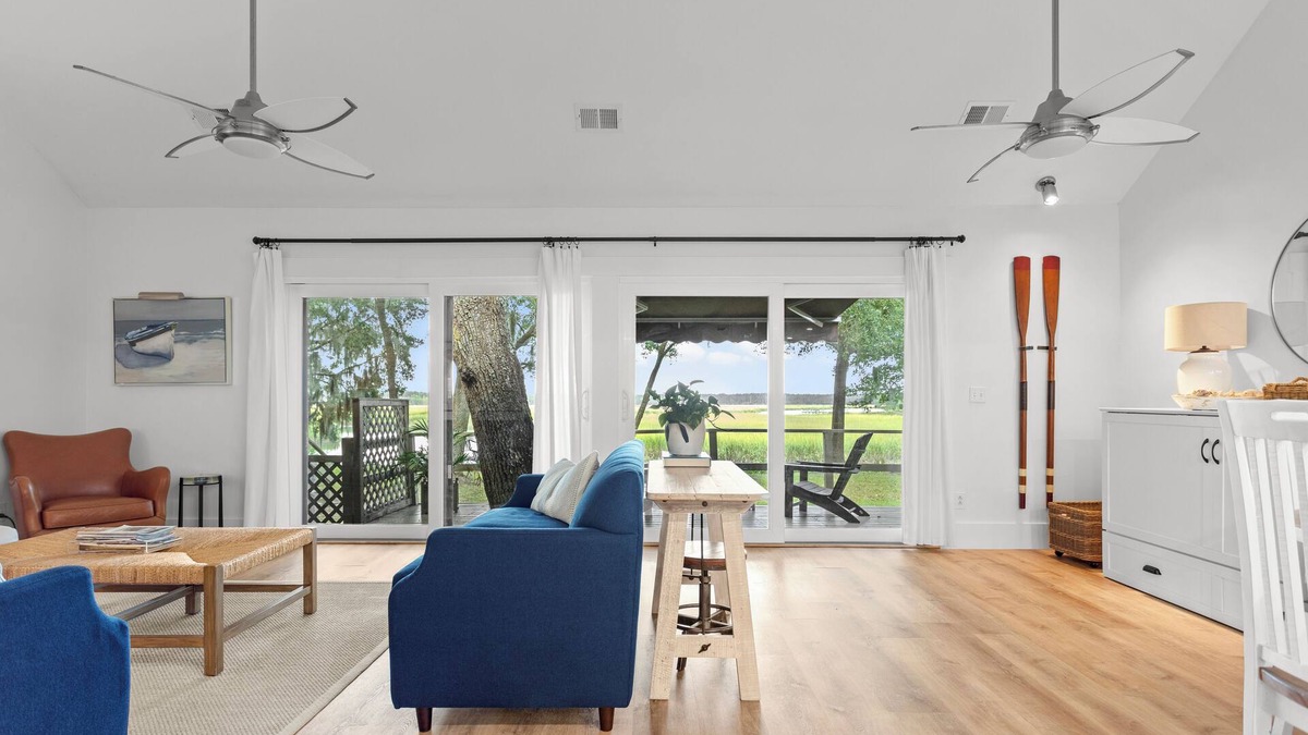 Pine Harbor House | Waterfront views of the beautiful Sapelo river from the living room and porch!