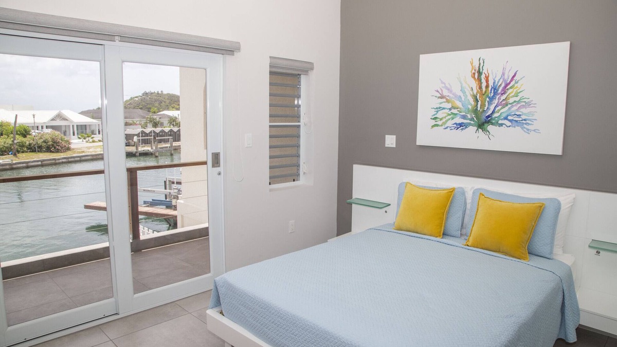 Jolly Harbour Ski Chalet | Waterfront Villa 246D South Finger