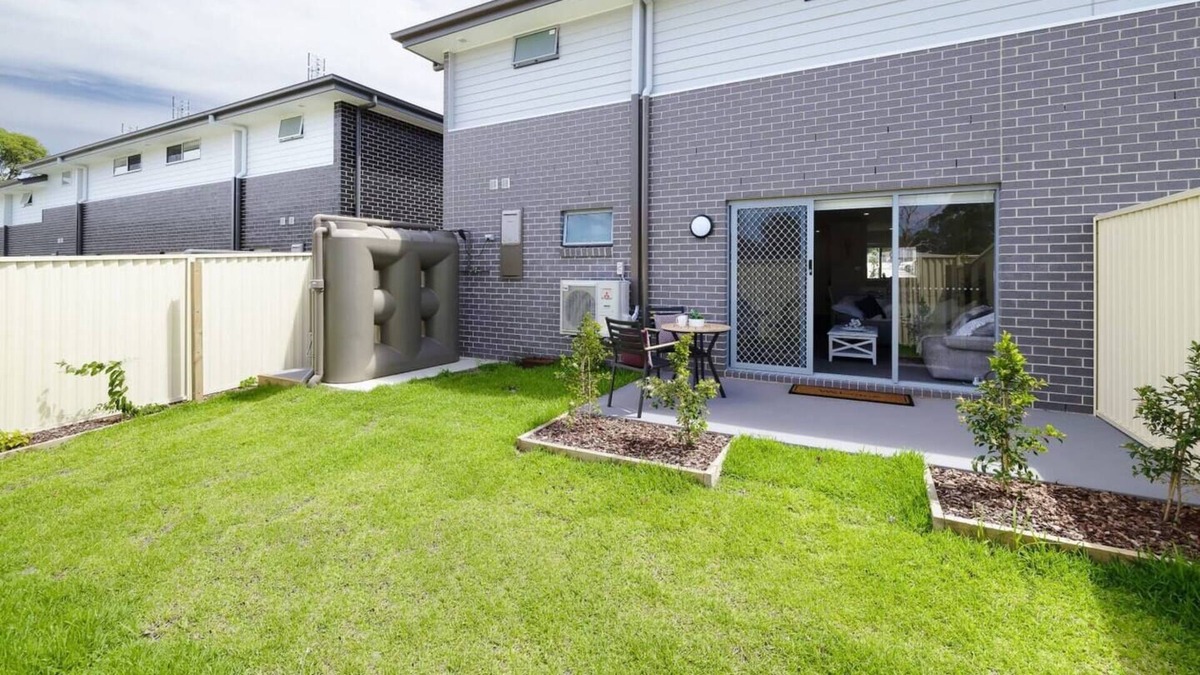 Charmhaven House | Welcome to your brand new stunning townhouse located in the Central Coast!