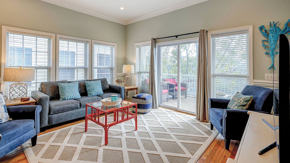 Waters Edge House | Welcoming water view townhome with pool, balcony, deck, & kitchen