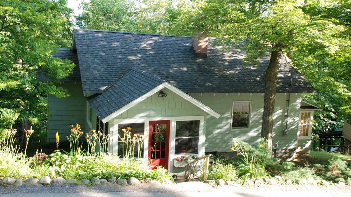 Saranac Lake House | Wooded Hilltop Retreat in Historic Saranac Lake