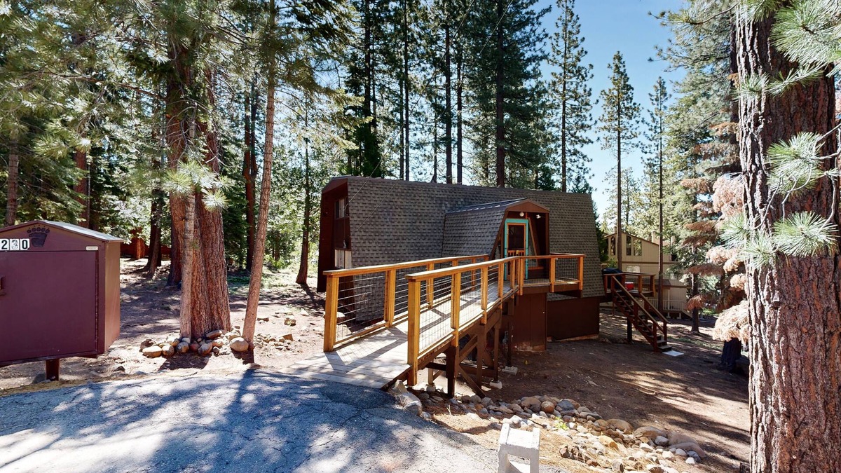 Kings Beach House | Woodland home in quiet location with deck, fireplace & entertainment options