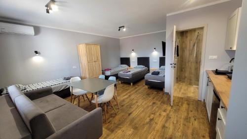 Checiny Apartment | Wrzosowe Wzgórze 5 - Studia i Apartamenty