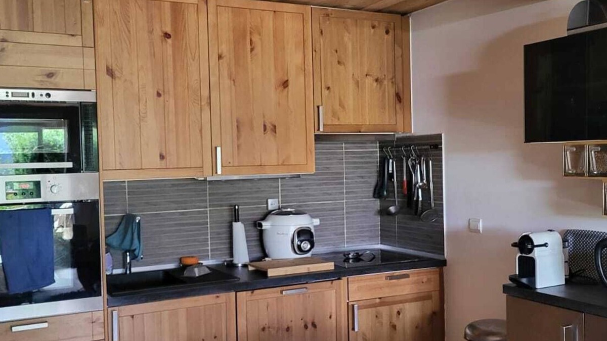 Briancon Apartment | Your corner of paradise has a greenhouse for all seasons.