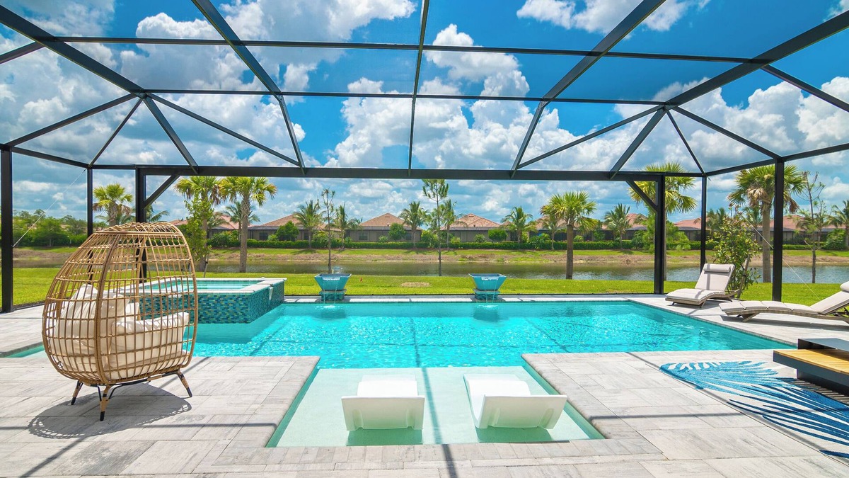 Bonita Springs House | YOUR OWN PARADISE WITH RESORT STYLE POOL and SPA -3 bedrooms +Den, 3 bths, 3 car