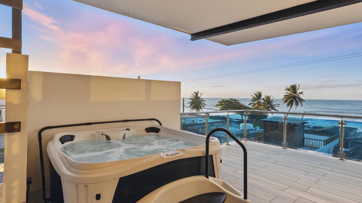 Arecibo Pueblo House | Zaturn Beach House – Oceanfront villa w/rooftop terrace & jacuzzi