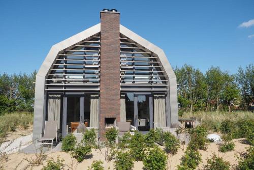 Egmond aan Zee House | Zicht op de Molen by Droomvilla