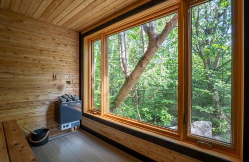 Adstock Ski Chalet | Évasion Nature Adstock - Sauna, Ski & Spa