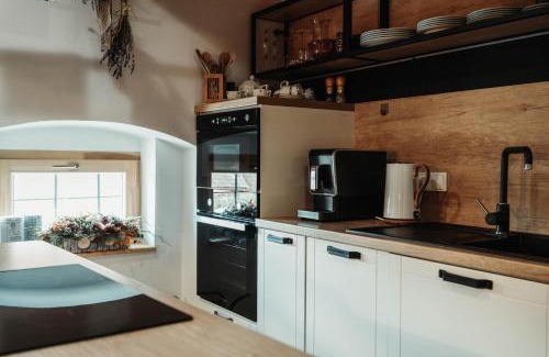 Smizany Apartment | ČÁKYHO KÚRIA - mezonetový apartmán s krbom a saunami