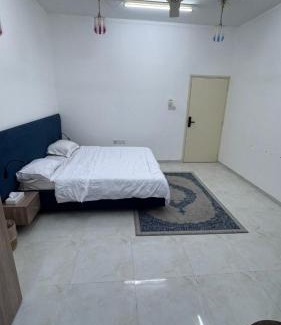 Nizwa Apartment | الذهب الزرق للشقق الفندقية فرق