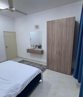 Nizwa Apartment | الذهب الزرق للشقق الفندقية فرق