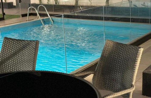 Al Kura Ski Chalet | شاليهات قولدين لاند