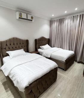 Riyadh Apartment | شقق نيرفانا بغرفتين نوم وصاله ومطبخ مستقل الخرج