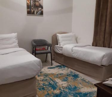 Mecca House | مكة المكرمة غرف عائلية فندق بجوار الحرم تخفيضات للمجموعات ناحية برج الساعة Makkah room in HOTEL near ALHARAM Multiple ROOM