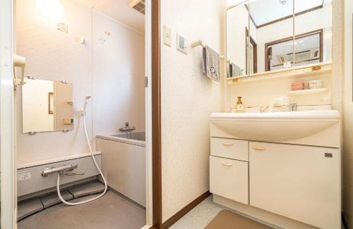 Taito Apartment | 台東区寝室4つと広々吹き抜けリビングのメゾネットタイプのお家