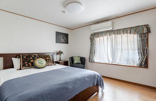 Naniwa Villa | 心斎橋から7分 なんばまで1駅 MeenoHome 幸せをひとりじめできる一軒家 空港直通 家族連れに最適な宿