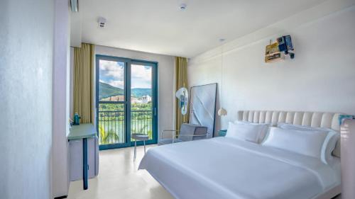 Jinghong Hotel | 西双版纳回见江景酒店