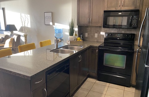 South Pandosy Condo | 1 Bedroom Condo - Amazing Lake and Mountain Views overlooking Pool and Hot Tub!