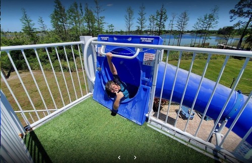 Clermont House | 10 Acre Lakefront Mansion Sleeps Up to 45 - Waterslide & Lazy River
