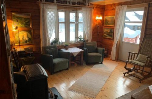 Kvaloya House | 100 Years Old Norwegian Log House in Tromsø