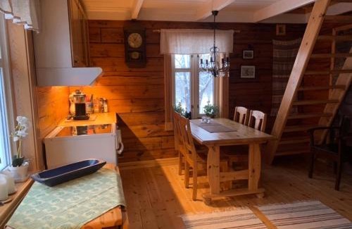 Kvaloya House | 100 Years Old Norwegian Log House in Tromsø