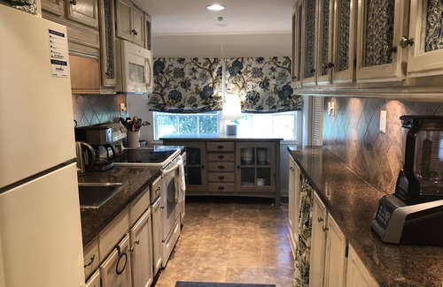 Lafayette Cottage | 1901 Historic Home's Guest Cottage with pool