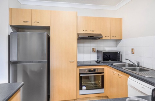 Mermaid Beach Apartment | 2-Bed Family Haven with Pools, BBQ & Playgrounds
