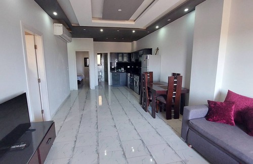 Al Ahyaa Ski Chalet | 2BR Apartment Side Sea View Pool Turtles Beach