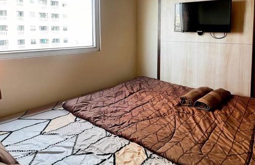 Rawasari Apartment | 2BR Apt Green Pramuka with Pool & Wi-Fi by 2ndHome