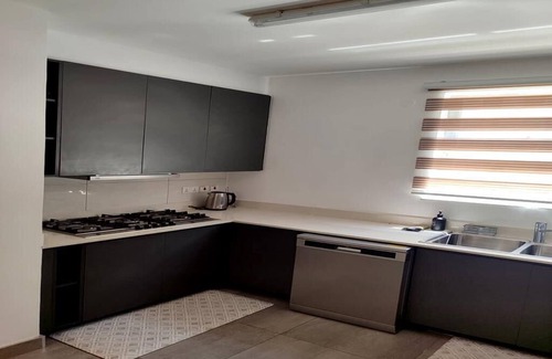 Central Business District House | 4-bedroom, 4.5 full bath secured luxury Town homes near Runda, Nairobi, Kenya