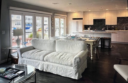 Normandy Beach House | 4 bedroom beach home- lagoon front deck, fantastic sunset views, pet friendly,