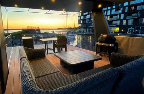 Nykobing Falster Boat Rental | 450 m² Houseboat ∙ 2 bedrooms ∙ 6 guests