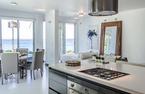 El Batey Apartment | 4BD groundfloor condo, pure beachfront, gym/pool/high-speed internet/cable TV