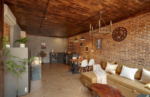 Downtown Ho Chi Minh City House | 4BR Industrial Gem with Rooftop Garden by Bến Thành