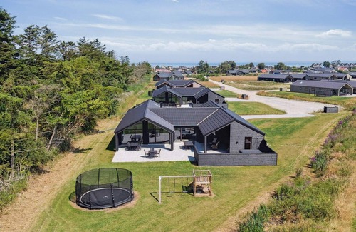 Hasmark Strand House | 5 star holiday home in Otterup