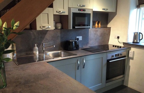 Keswick Cottage | A 17th century cottage nestling in the foothills of the Skiddaw range.