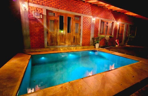 Kandy Ski Chalet | A forest stay, one sip at a time! Warm hospitality in a calm and serene setting.