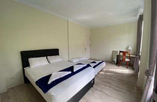 Tomohon Villa | A Spacious Tropical 4 Bedrooms with Bathrooms Villa Marion Tomohon with the view of Gunung Lokon