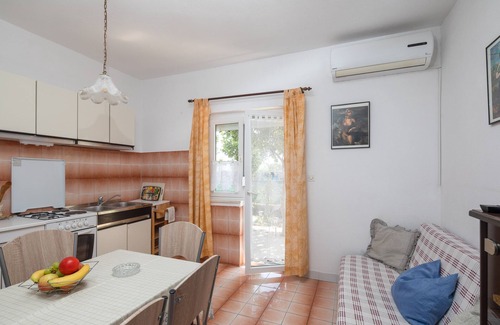 Stobrec Apartment | A1 - apt near beach with patio, parking and grill