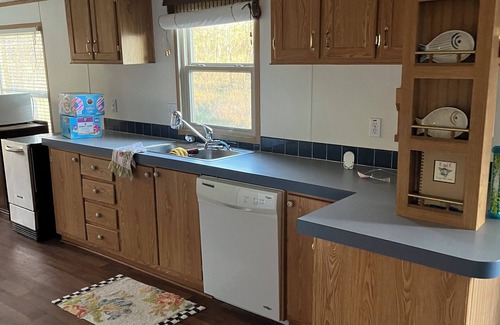 Vian Cabin | Accommodating up to 12 people w/3 bedrooms, 2 bathrooms & a super-sized firepit.