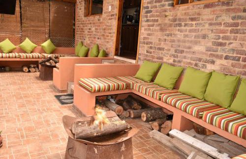 Tabio House | Acogedora Cabaña En Tabio con zonas verdes y BBQ